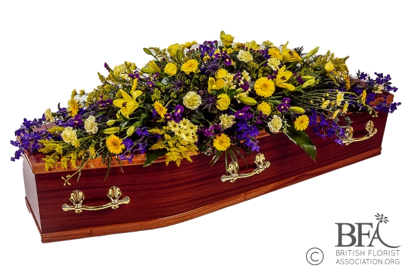 Luxury Traditional Mixed Coffin Spray Yellow & Purple With Lilies